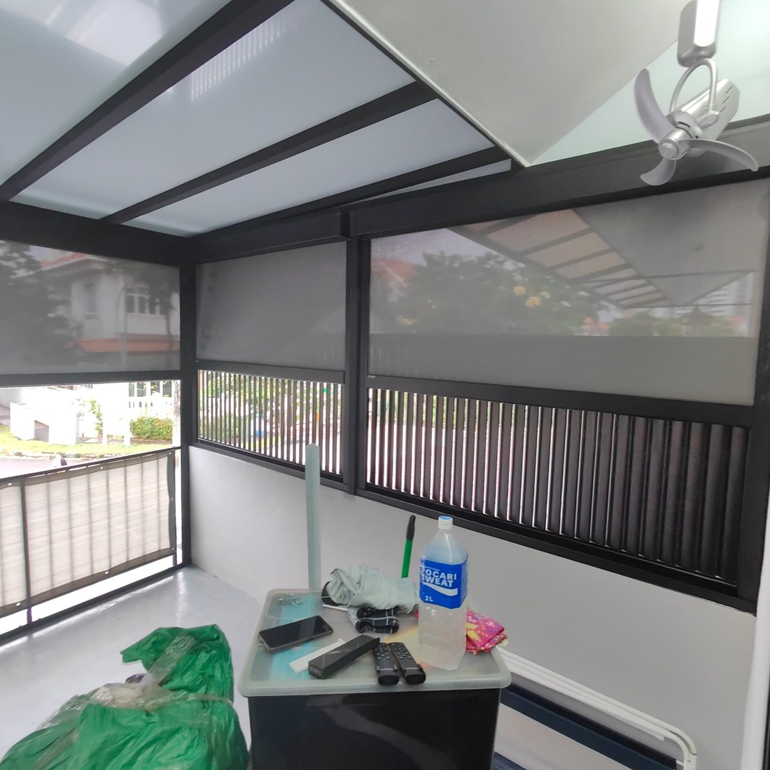 Outdoor zip blinds on a landed home patio
